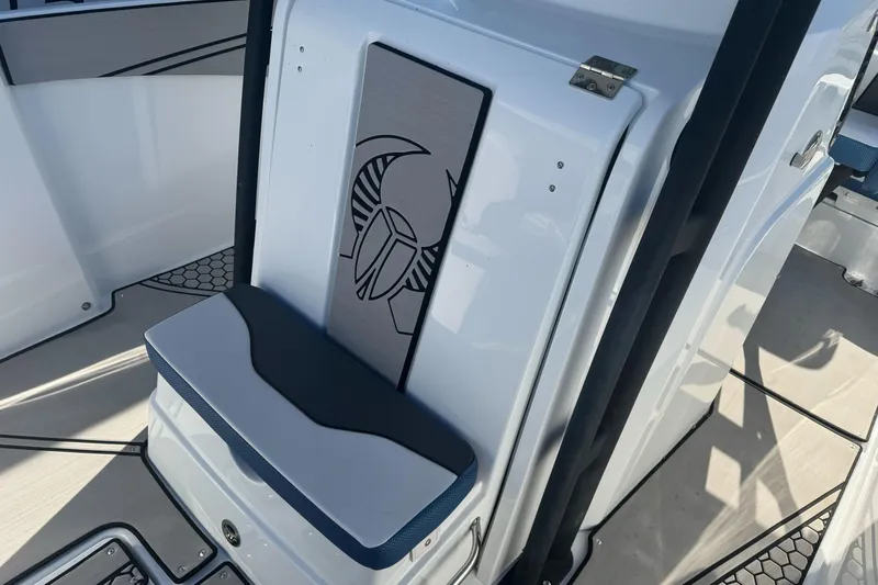 Slide: The Image of 2020 Scarab 255 Open ID boat interior with sleek seating and modern design. - 19