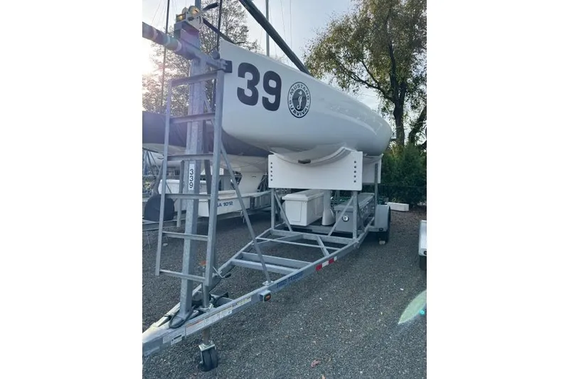 Slide: The Image of 2013 J Boats J/70 sailboat on trailer, number 39. - 2