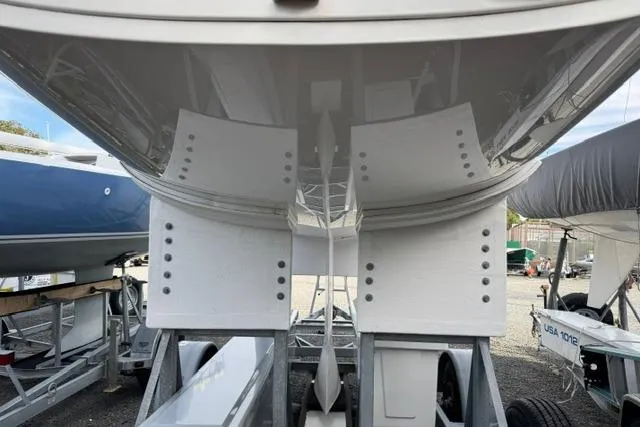 Slide: The Image of 2013 J Boats J/70 sailboat hull on trailer, viewed from below. - 7