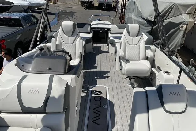 Slide: The Image of 2025 Avalon LSZ Quad Lounge Shift boat interior with luxurious seating and modern design. - 6