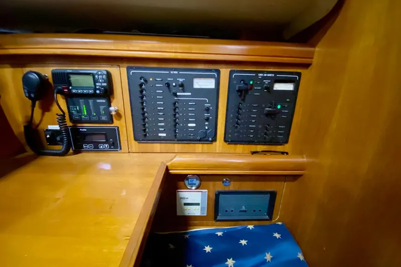 Slide: The Image of Control panel of 2006 Hunter 41 Deck Salon yacht with communication equipment. - 11
