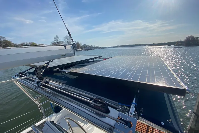 Slide: The Image of Hunter 41 Deck Salon 2006 with solar panels on deck, sailing on a sunny day. - 25