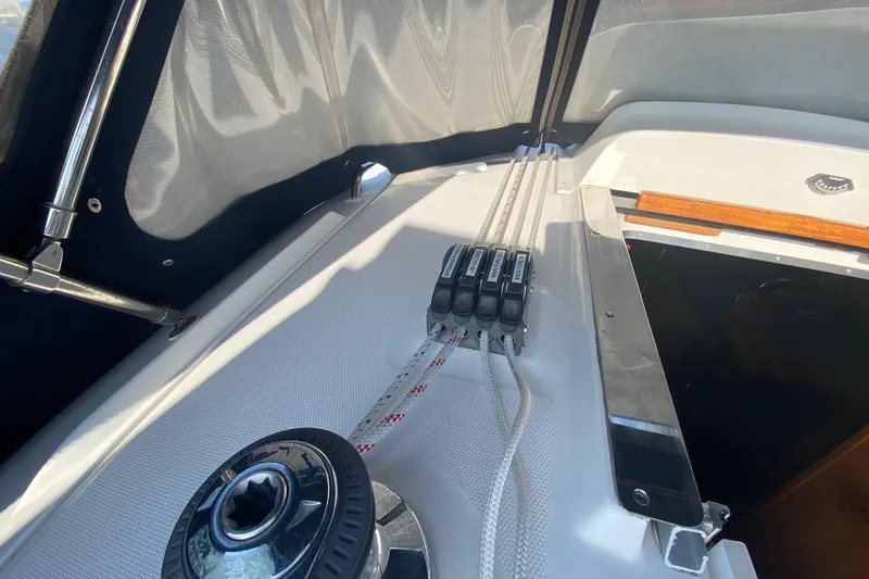 Slide: The Image of Deck of 2006 Hunter 41 Deck Salon sailboat with winch and rope clutches. - 31