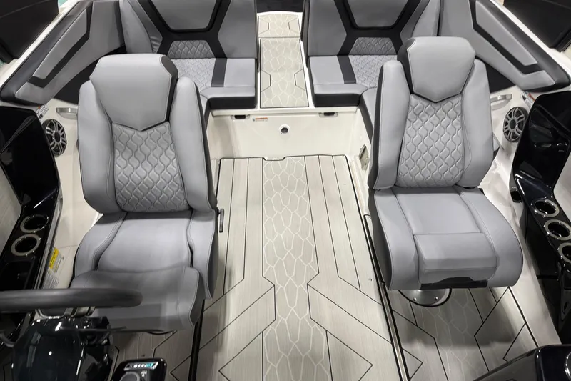 Slide: The Image of 2026 Yamaha Boats 222XD interior with sleek gray seating and modern design. - 7