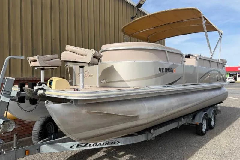 The Image of 2013 SunChaser PONTOON 22 boat on EZ Loader trailer, beige with canopy. - 1