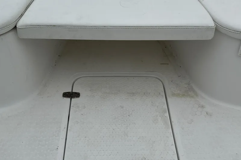 Slide: The Image of Boat dashboard with compass, Concept 27 model, 2015, parked near vehicles. - 103