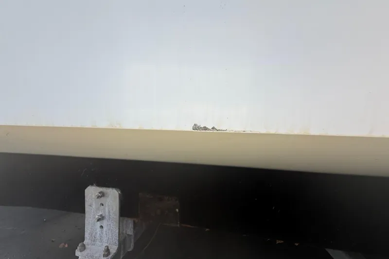 Slide: The Image of Close-up of Concept 27 (2015) boat hull with visible wear and support bracket. - 119