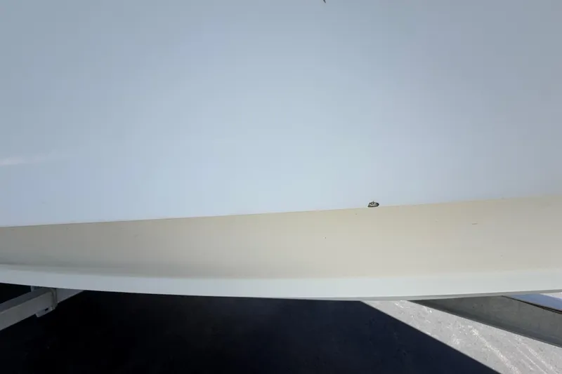 Slide: The Image of White surface of a 2015 Concept 27 boat, showing minor blemish. - 123