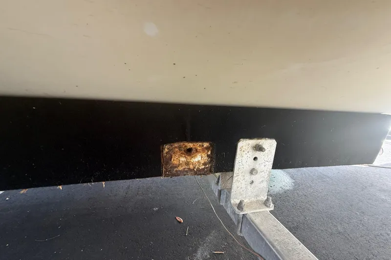 Slide: The Image of Rusty metal bracket on Concept 27 boat trailer, 2015 model. - 128