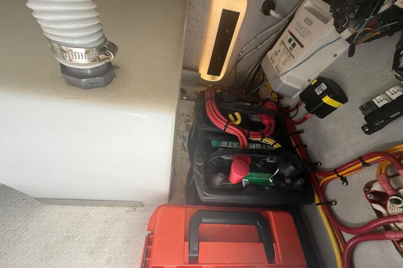 Slide: The Image of Electrical setup in a Concept 27 model, featuring batteries and wiring, 2015. - 137