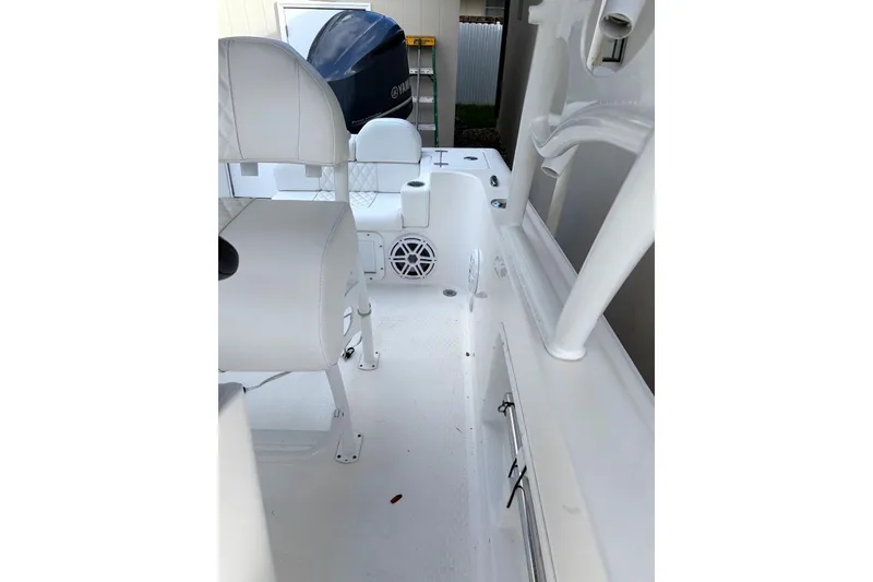 Slide: The Image of White leather boat seating with diamond stitching, cup holders, and speaker, Concept 27, 2015 model. - 16