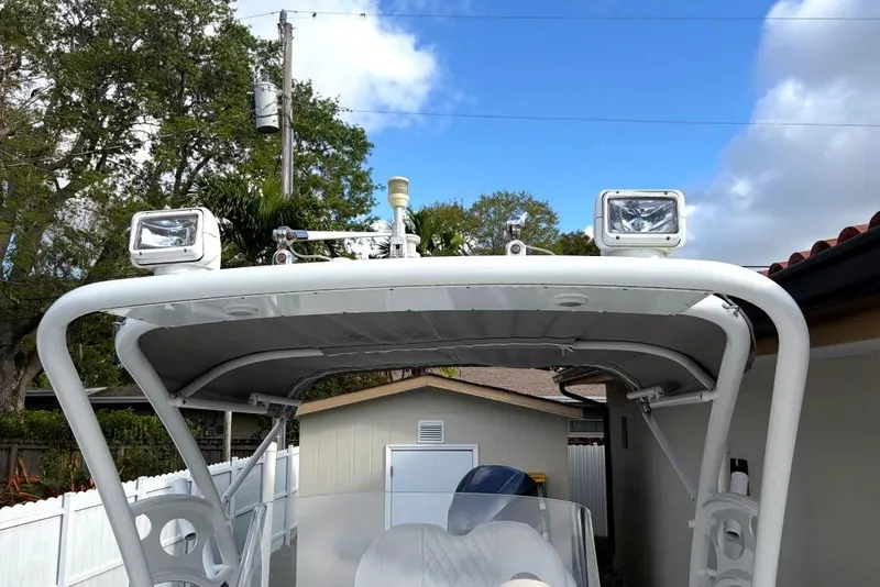 Slide: The Image of Interior view of a 2015 Concept 27 boat with rod holders and dashboard. - 18