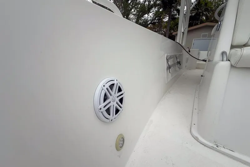 Slide: The Image of Rear view of a 2015 Concept 27 boat with a shiny propeller. - 49