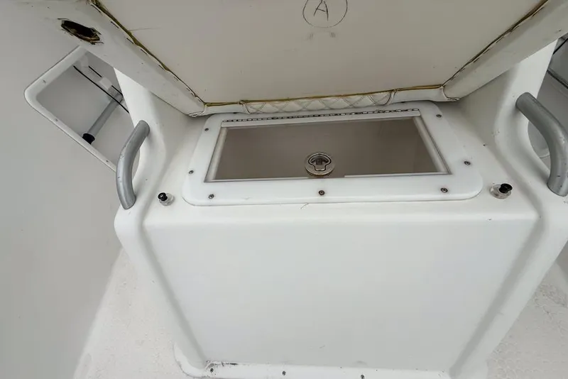 Slide: The Image of Rear view of a 2015 Concept 27 boat on a trailer in sunlight. - 50