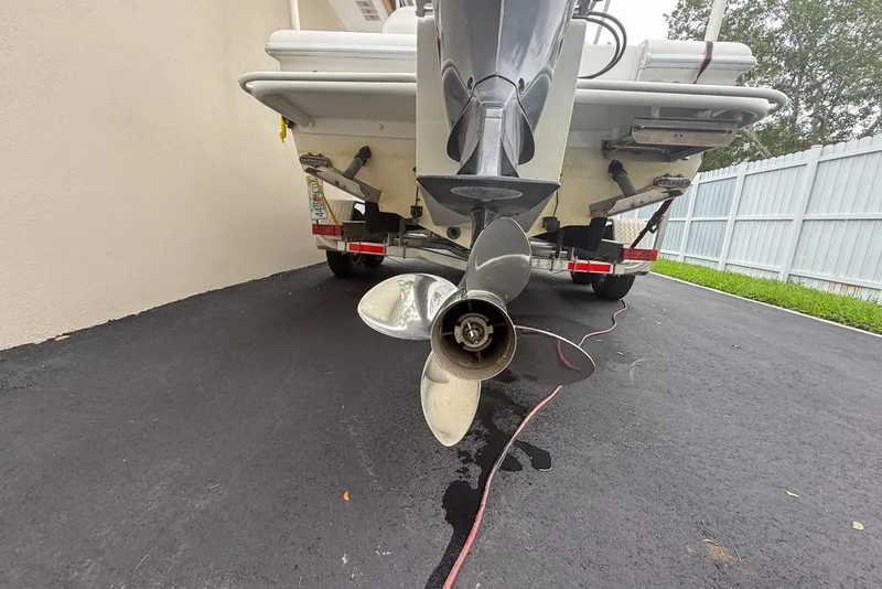 Slide: The Image of Underneath view of a 2015 Concept 27 boat on a trailer. - 57