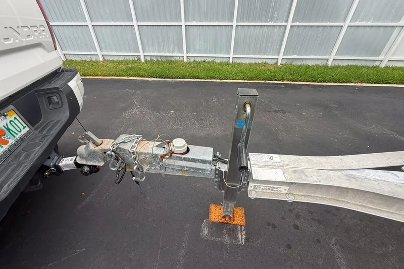 Slide: The Image of Close-up of a 2015 Concept 27 boat with visible logo and sleek design. - 70