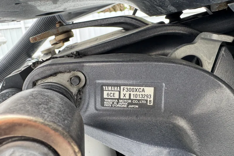 Slide: The Image of White fishing rod holders on a Concept 27 boat, model year 2015. - 81