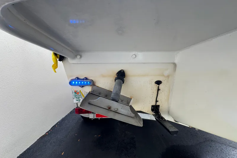 Slide: The Image of Control panel of a 2015 Concept 27 boat with steering and navigation equipment. - 91