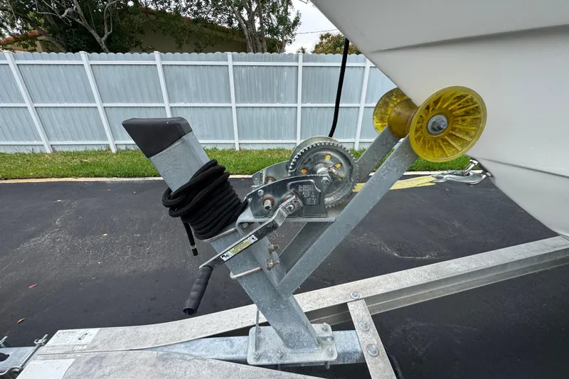 Slide: The Image of Steering console of a 2015 Concept 27 boat, featuring modern controls and navigation equipment. - 93