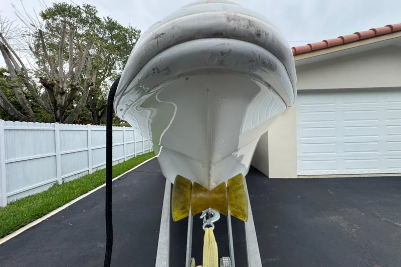 Slide: The Image of Garmin navigation display on 2015 Concept 27 boat dashboard, reflecting surroundings. - 96