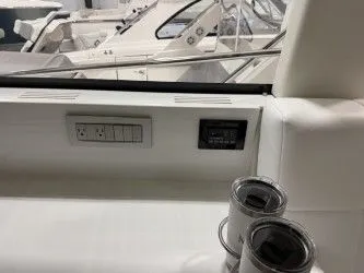 Slide: The Image of 2024 Regal 38 GC yacht with Garmin equipment indoors. - 13