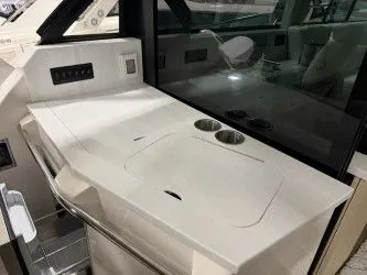 Slide: The Image of Interior of 2024 Regal 38 GC boat, gray and white details. - 14