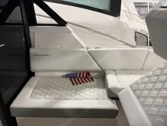 Slide: The Image of 2024 Regal 38 GC yacht interior with sleek windows. - 16