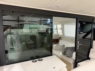 Slide: The Image of Interior of 2024 Regal 38 GC featuring modern kitchenette. - 17