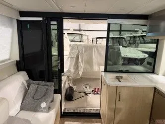 Slide: The Image of Luxurious seating on Regal 38 GC boat, model year 2024. - 18