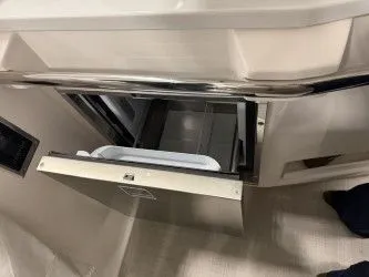 Slide: The Image of Interior of 2024 Regal 38 GC yacht with modern amenities. - 24