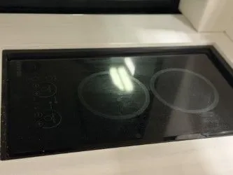 Slide: The Image of 2024 Regal 38 GC interior with white sofa and wooden table. - 25