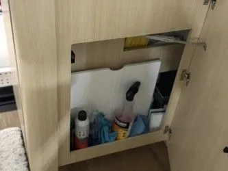 Slide: The Image of Interior of 2024 Regal 38 GC yacht with carpet and cabinets. - 26