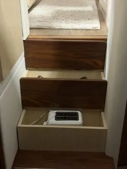 Slide: The Image of Interior of 2024 Regal 38 GC with cozy bed and pillows. - 36