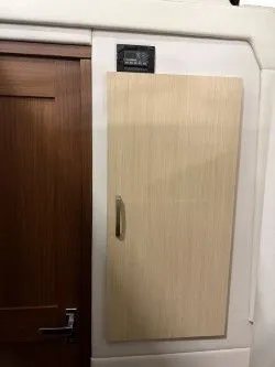 Slide: The Image of Regal 38 GC 2024, drawer with power strip in wooden staircase. - 37