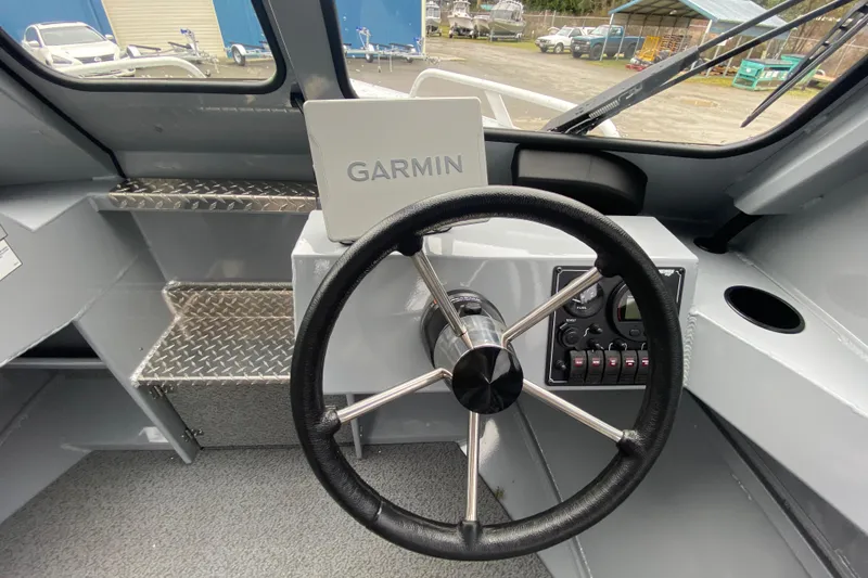 Slide: The Image of Interior of 2026 Hewescraft 200 ProV Hard Top with Garmin navigation system. - 12