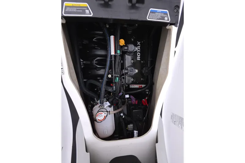 Slide: The Image of Engine compartment of 2025 Sea-Doo FishPro Sport 170, showcasing Rotax engine components. - 13