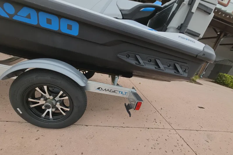 Slide: The Image of 2025 Sea-Doo FishPro Sport 170 on Magic Tilt trailer, side view. - 15