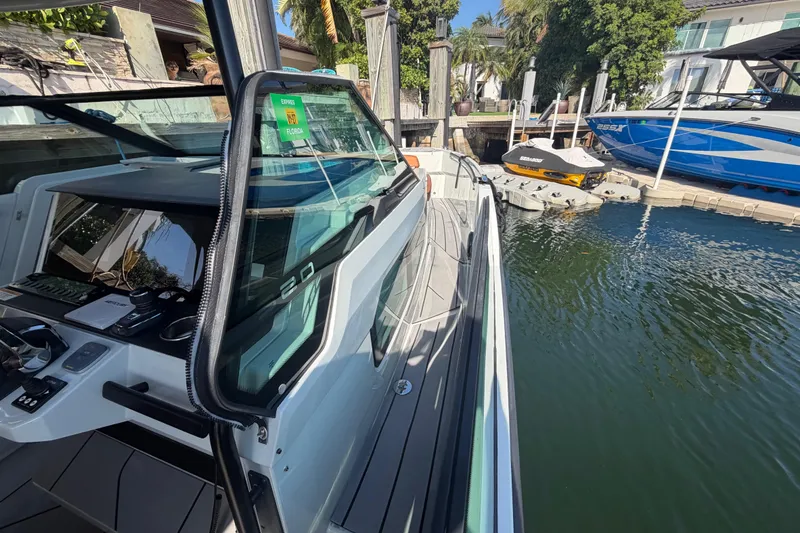 Slide: The Image of 2024 Saxdor 320 GTO docked, showcasing sleek design and modern features. - 12