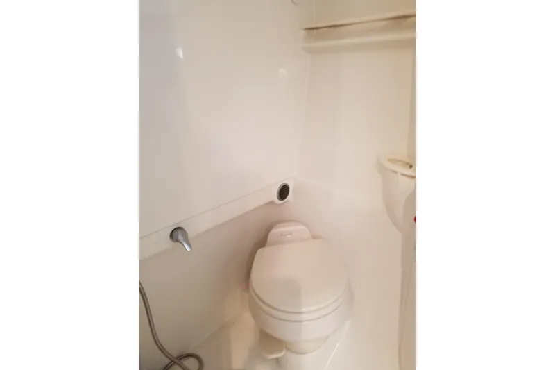 Slide: The Image of Compact bathroom in 2005 Formula 31 Performance Cruiser boat. - 10