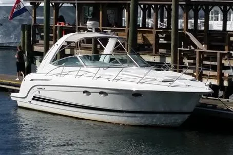 Slide: The Image of 2005 Formula 31 Performance Cruiser docked at a marina. - 5