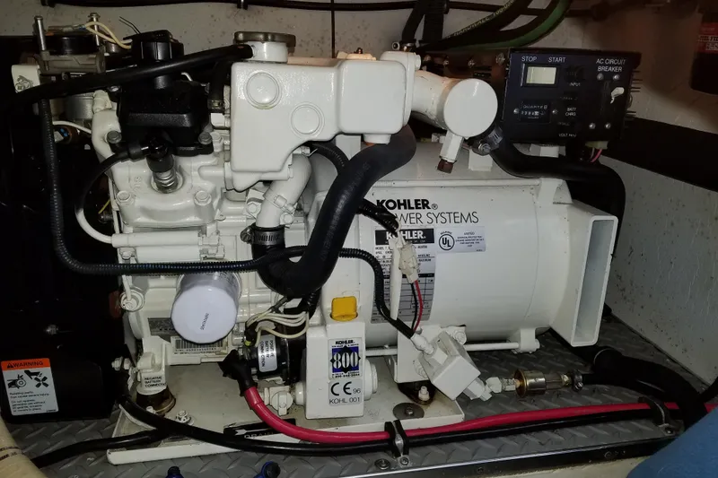 Slide: The Image of Engine compartment of a 2005 Formula 31 Performance Cruiser with Kohler power systems. - 6