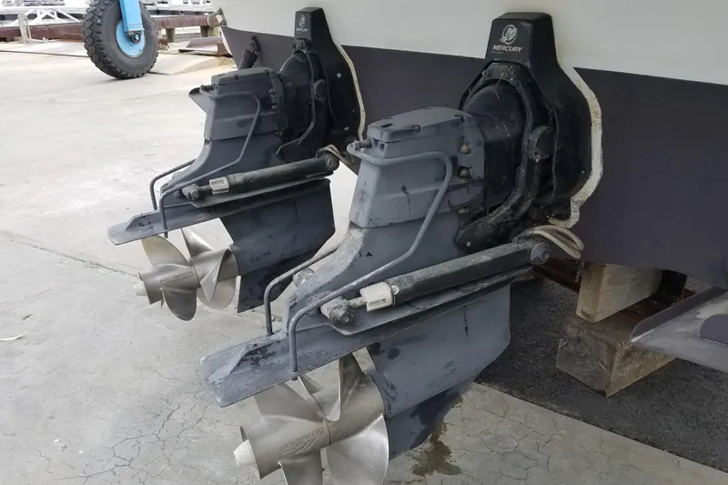 Slide: The Image of Dual Mercury outboard motors on a 2005 Formula 31 Performance Cruiser. - 7