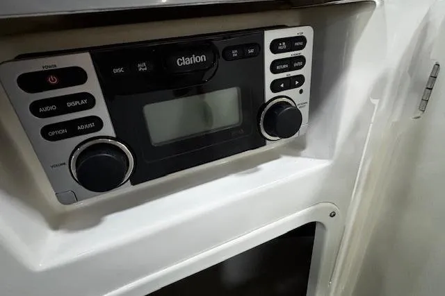 Slide: The Image of Clarion audio system in 2013 Chaparral 226 SSi boat interior. - 14