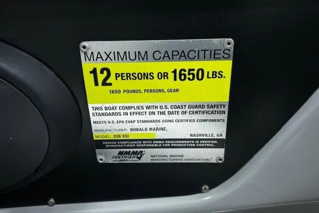 Slide: The Image of Maximum capacity label on 2013 Chaparral 226 SSi boat: 12 persons or 1650 lbs. - 21