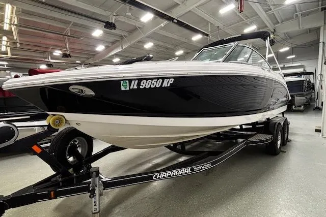Slide: The Image of 2013 Chaparral 226 SSi boat on trailer in indoor showroom. - 26