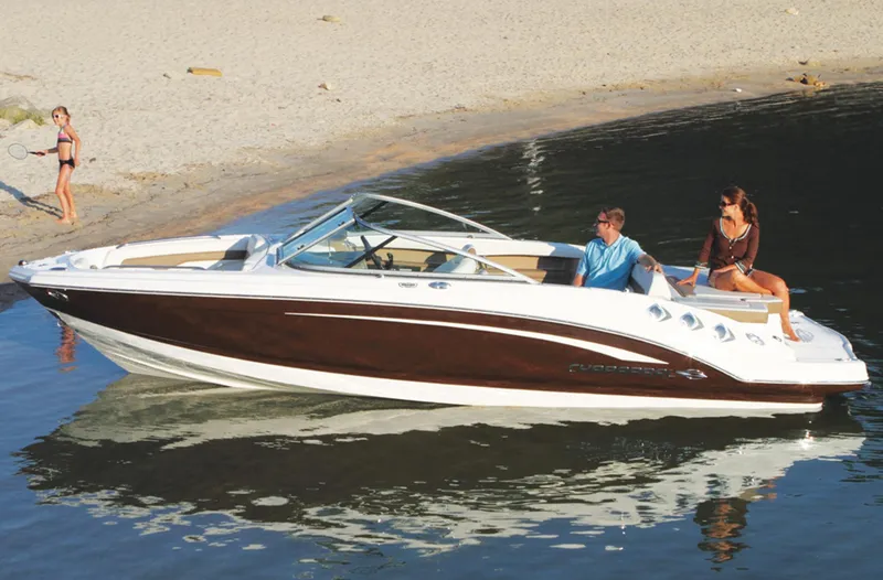 Slide: The Image of Manufacturer Provided Image: 2013 Chaparral 226 SSi boat near sandy beach with people onboard. - 3