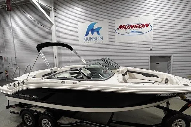 Slide: The Image of 2013 Chaparral 226 SSi boat displayed indoors at Munson Surf & Marine showroom. - 41