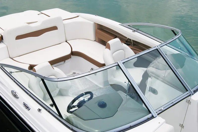 Slide: The Image of Manufacturer Provided Image: 2013 Chaparral 226 SSi boat interior with white and brown seating. - 5