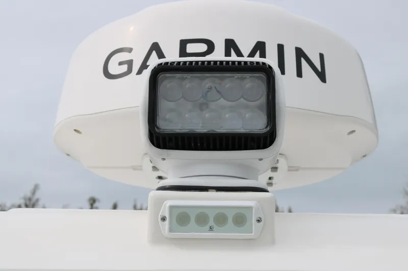 Slide: The Image of 2024 World Cat 280 DC-X boat with Garmin radar and spotlight. - 24