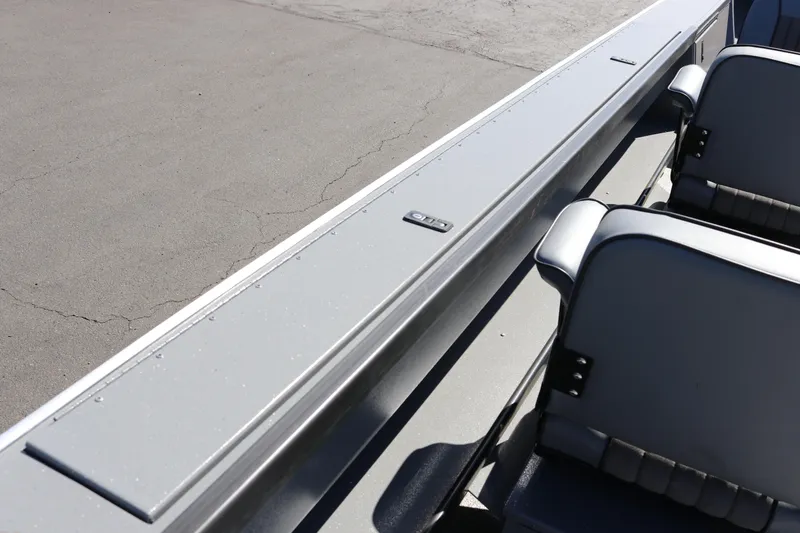 Slide: The Image of 2025 Alumaweld Columbia 23 boat interior with seating and sleek design. - 17